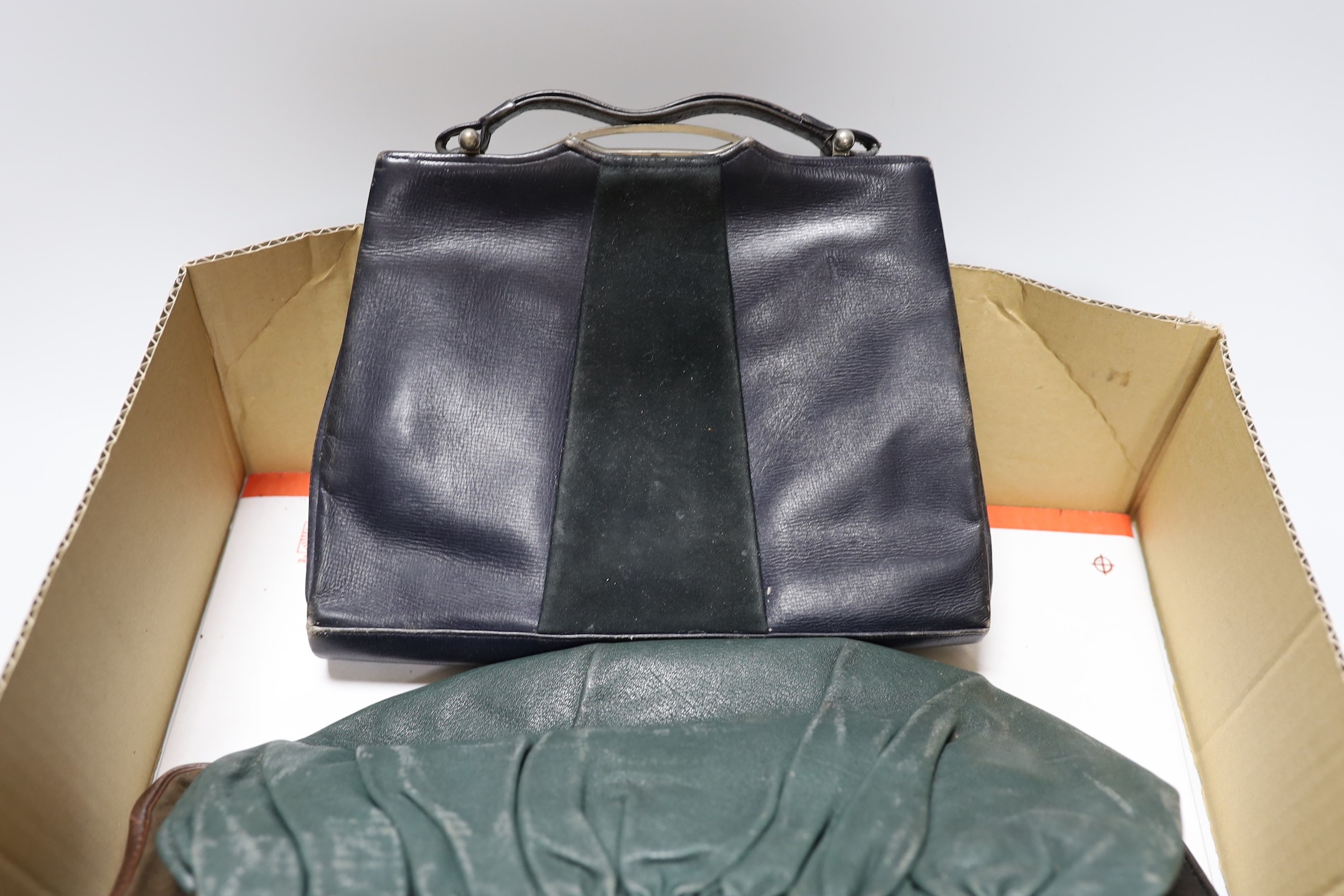 A collection of nine 1930's and 1940's leather, suede and crocodile ladies handbags with unusual metal clasps and frames